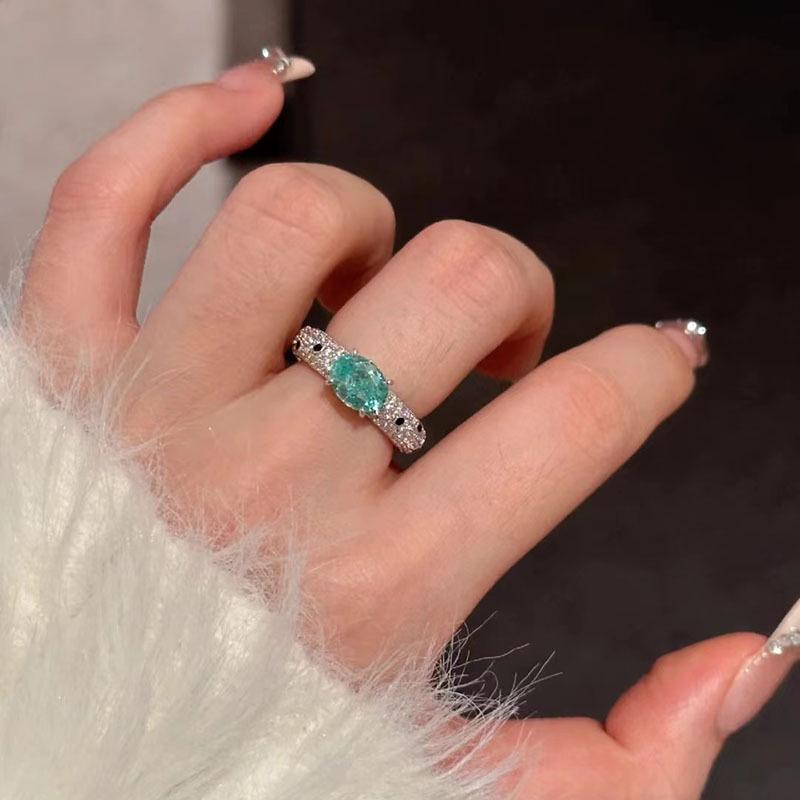 Hui Zhi Yi S925 Silver Paraiba Ice Flower Ring with Full Diamond Setting.