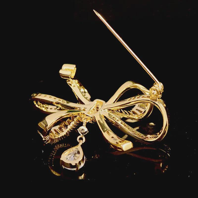 Elegante spilla a fiocco retrò con zircone microintarsiato – accessorio elegante per abito da donna