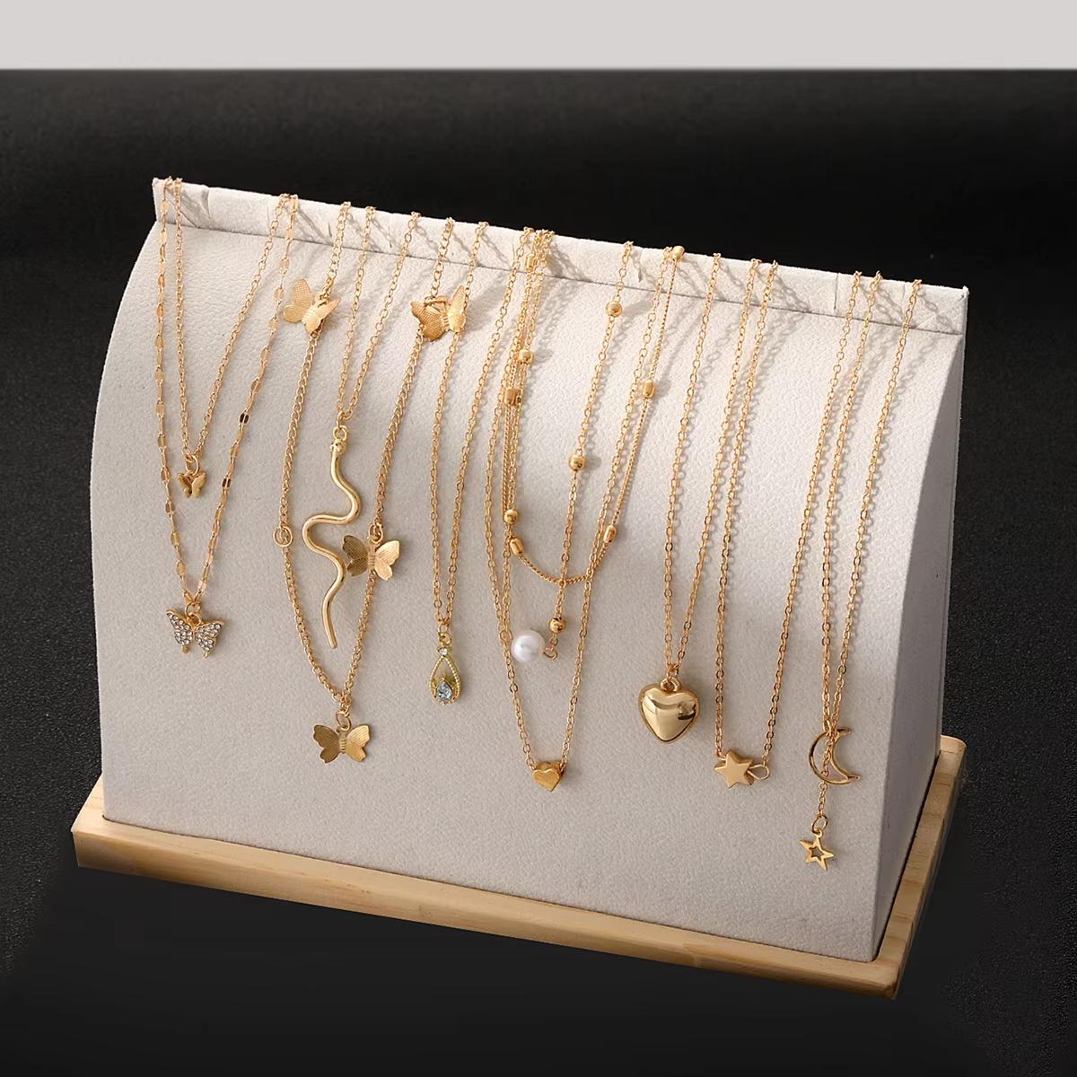 

9 Pcs Multi-layered Gold Color Necklace Set for Women Fashion Zircon Heart Butterfly Star Moon Snake Pendant Necklaces Set