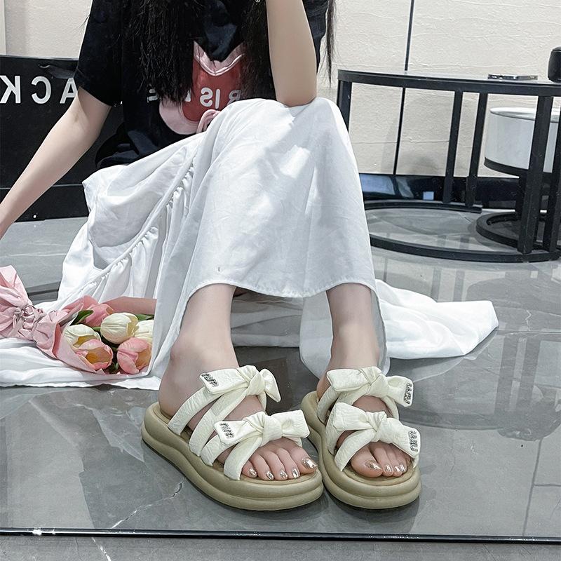 Flat-bottomed Bow Slippers for Women's Summer Wear 2025 New Seaside Beach Shoes with Skirts Lazy One-pedal Slippers