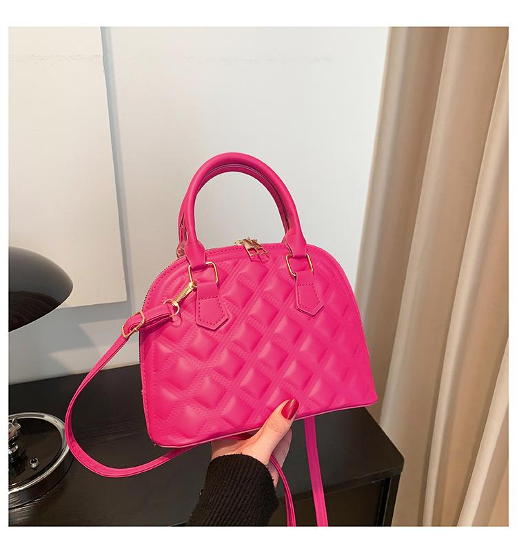 

Модная однотонная ромбовидная сумка 2025 тренд осень новая повседневная на плечо кроссбоди сумка-ракушка розовый