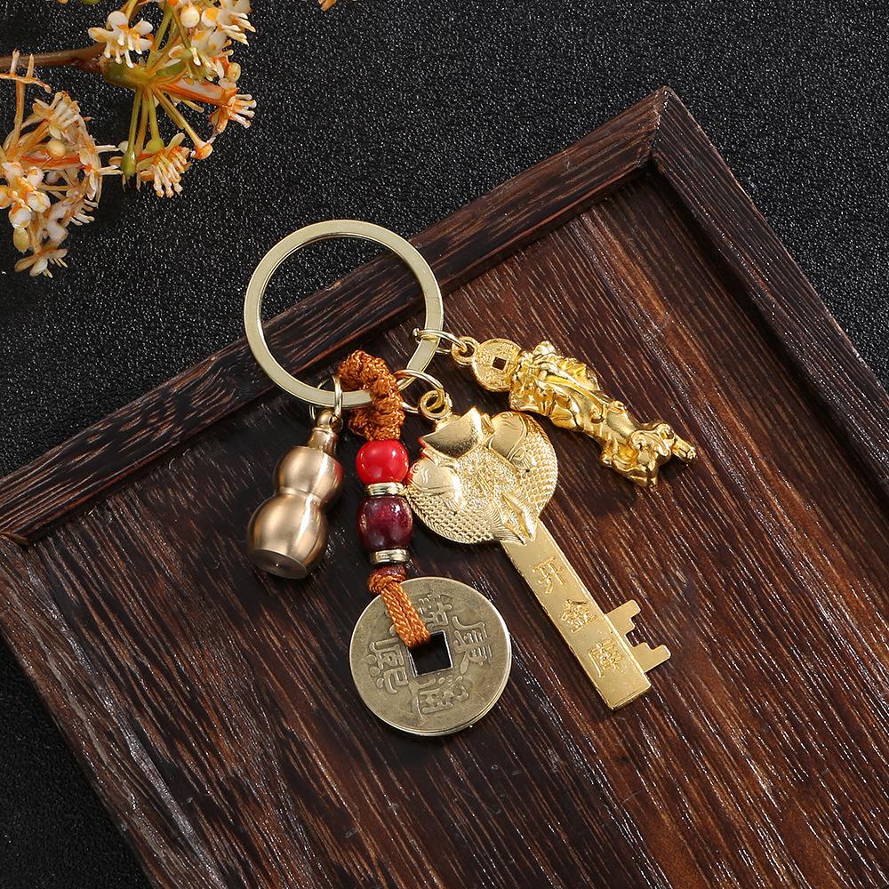 

Брелок с золотыми монетами «Пять императоров» в виде новогоднего дракона Pixiu Zodiac OPP Bag