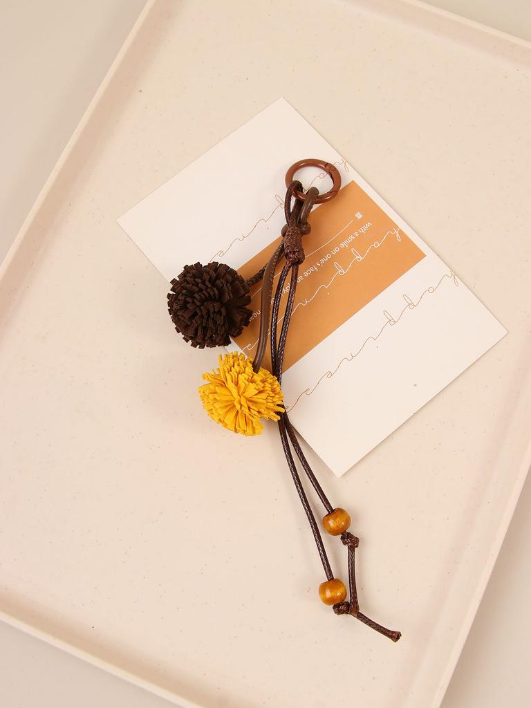 Miu series retro color fringed ball bag pendant doll pendant hand bag fringed pendant casual versatile match