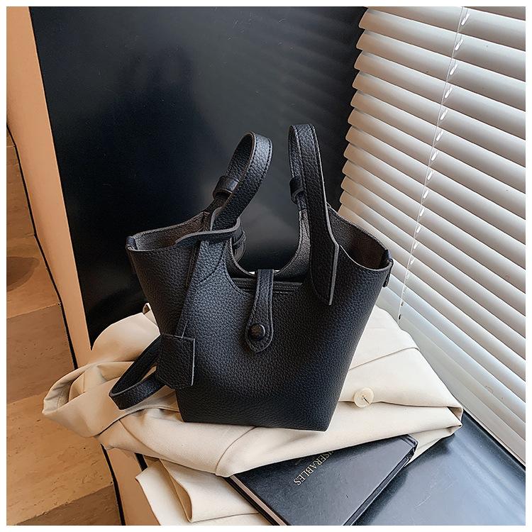 Wholesale 2025 new niche lychee pattern handbag bag women's Korean version simple bucket bag casual messenger bag