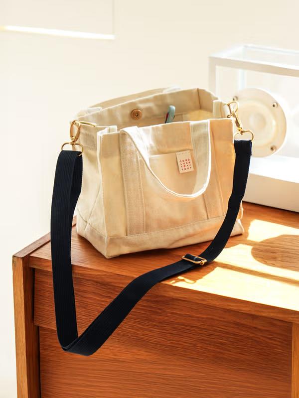 

Міні-сумка кросбоді на ремінці Daiso - Темно-синя