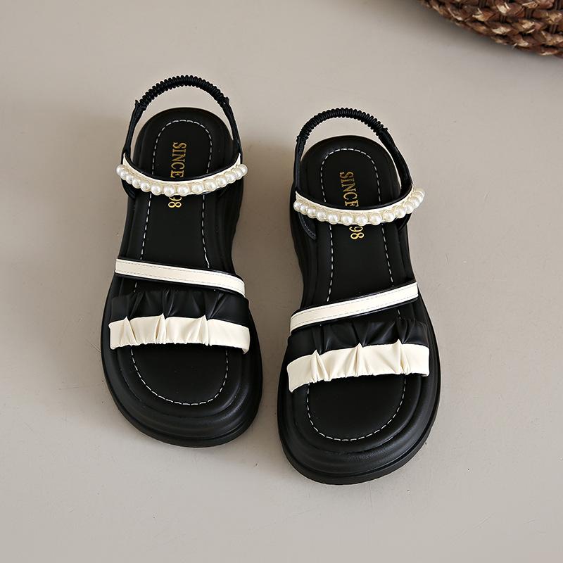 

Open-toed fairy wind pleated sandals female 2025 summer new French temperament one-word buckle beach Roman sandals female 34 чёрный