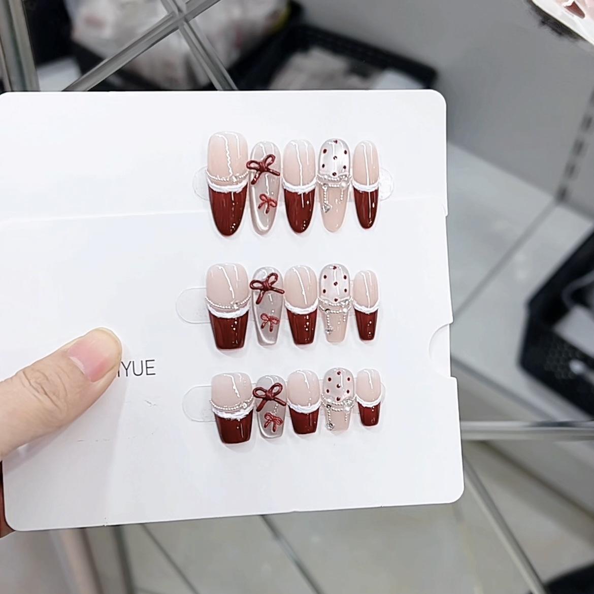 

Чисто ручная работа Фототерапия Носимые накладные ногти Сладкий винно-красный Носимые накладные ногти Готовый продукт Многоразовый нейл-арт Large L