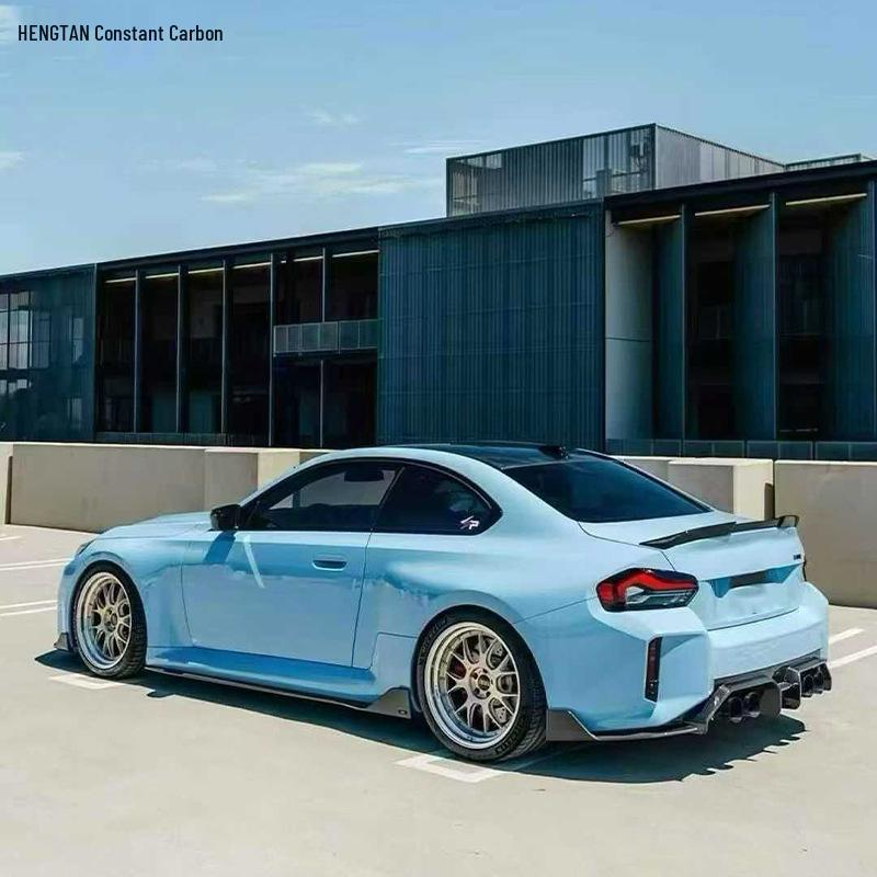 Carbon Fiber Body Kit for BMW M2 G87 (2023+): AD Style Front Lip, Rear Lip, Side Skirts.