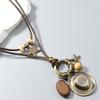 Western Styles Long Chain Necklace Artisanal Crafted Wax Cord Alloy Pendant Wooden Bead Accents Retro Fashion Accessory