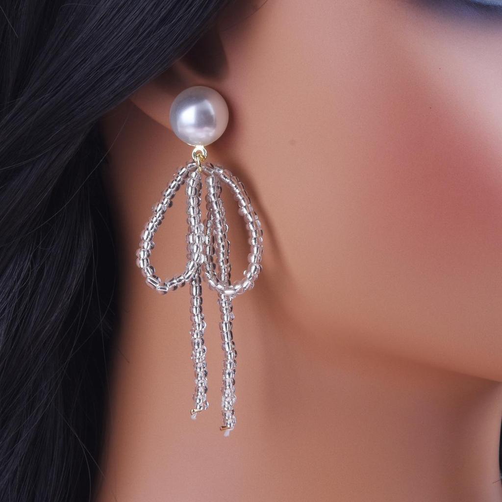 Elegant 2024 Pearl Tassel Earrings: Retro Luxury & Trendy Design for Women