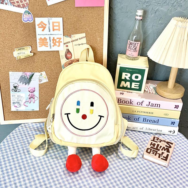 Adorable Plush Smile Face Backpack For Kids Unique Design Lightweight And Spacious