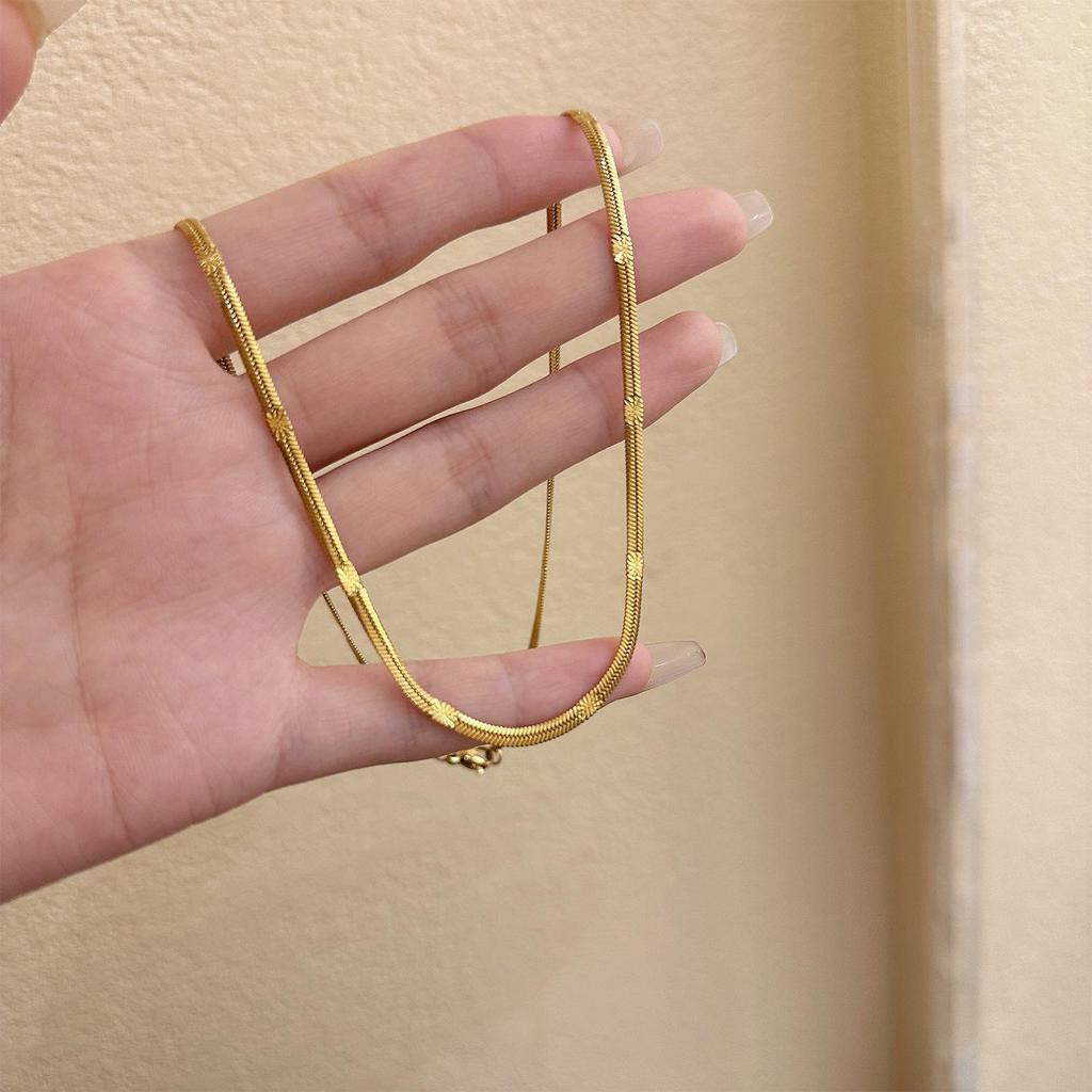 2024 Trendy Titanium Steel Embossed Clavicle Necklace: Light Luxury, Non-Fading, Simple Elegance for Women.