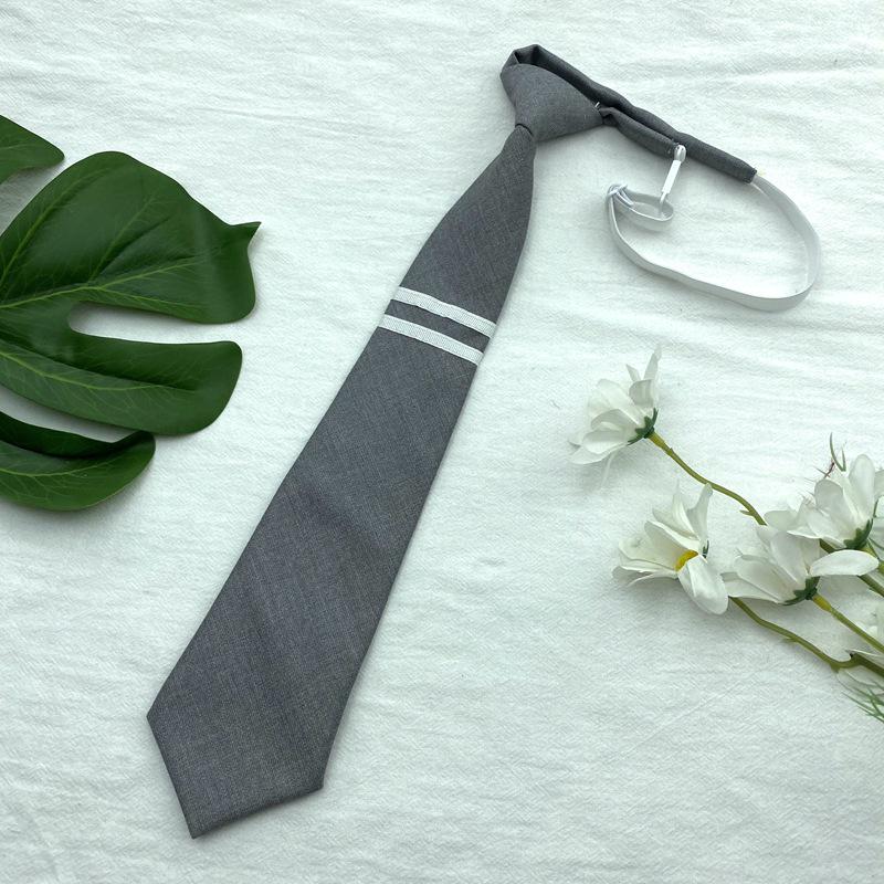 Women's Gray Bow Tie Uniform with Striped Skirt and Bowknot Collar.