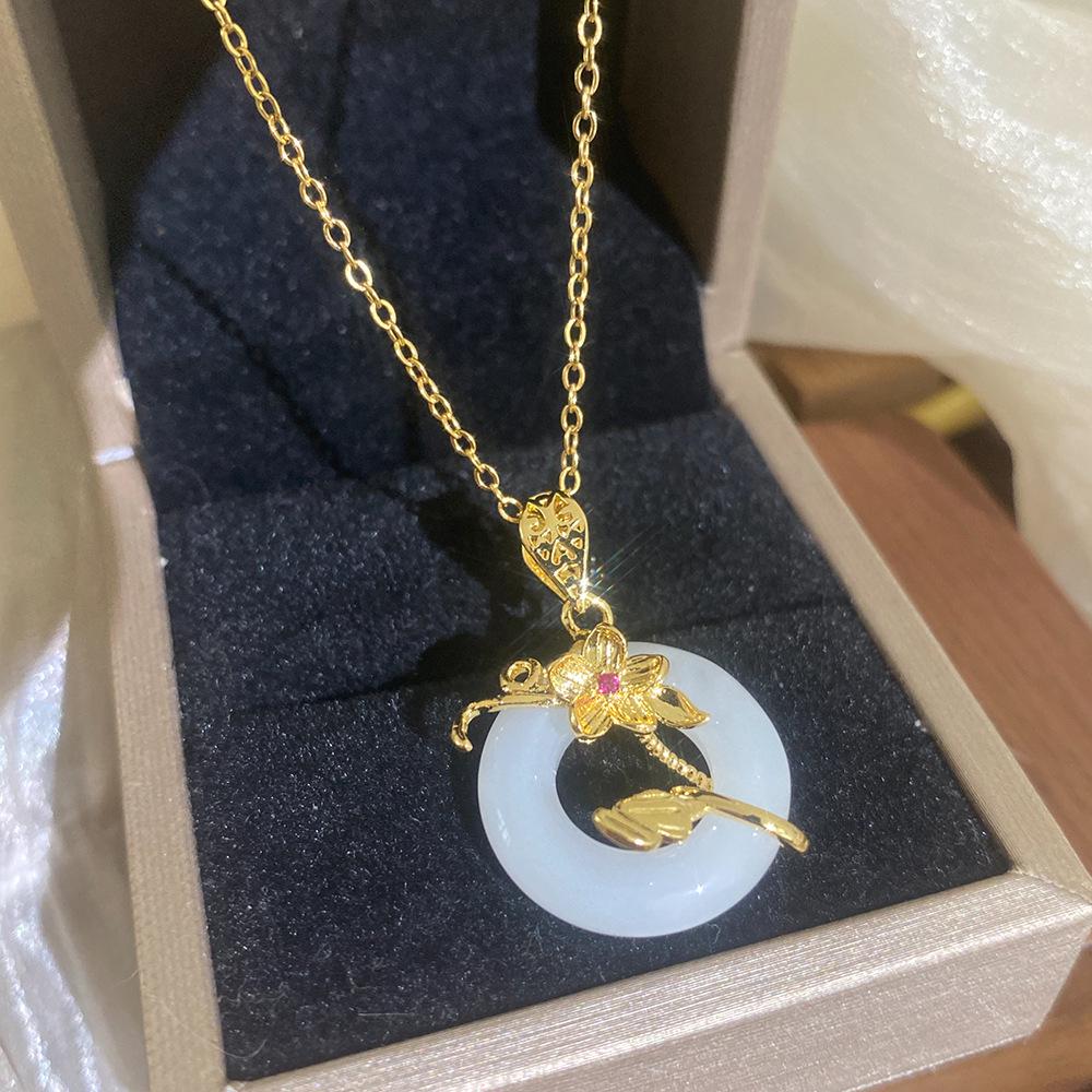 Elegant Lotus Knot Pendant Necklace: National Style Design with Hollow Blooming Lotus on Versatile Round Chain for Women