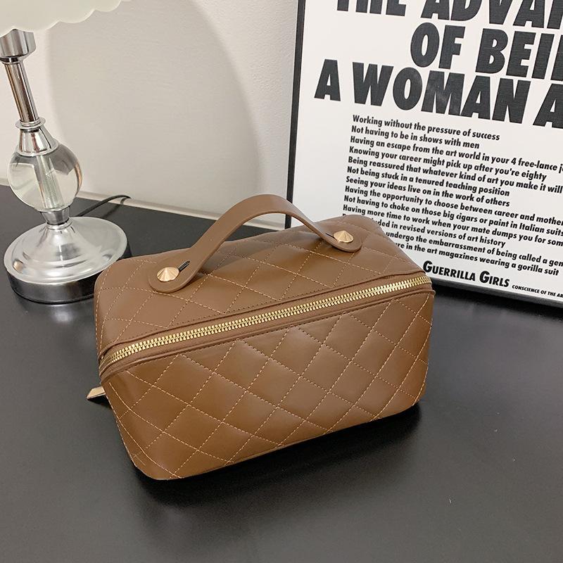 Neue hochwertige PU-Make-up-Tasche, modische und einfache gesteppte Kissen-Handtasche zur Handaufbewahrung, große Kapazität, Kulturtasche