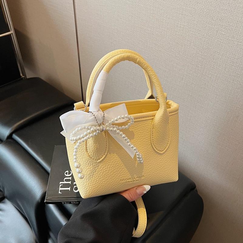 2025 nová mašle perlová kabelka dámská móda ležérní svěží jednoduchá ramenní crossbody niche design taška