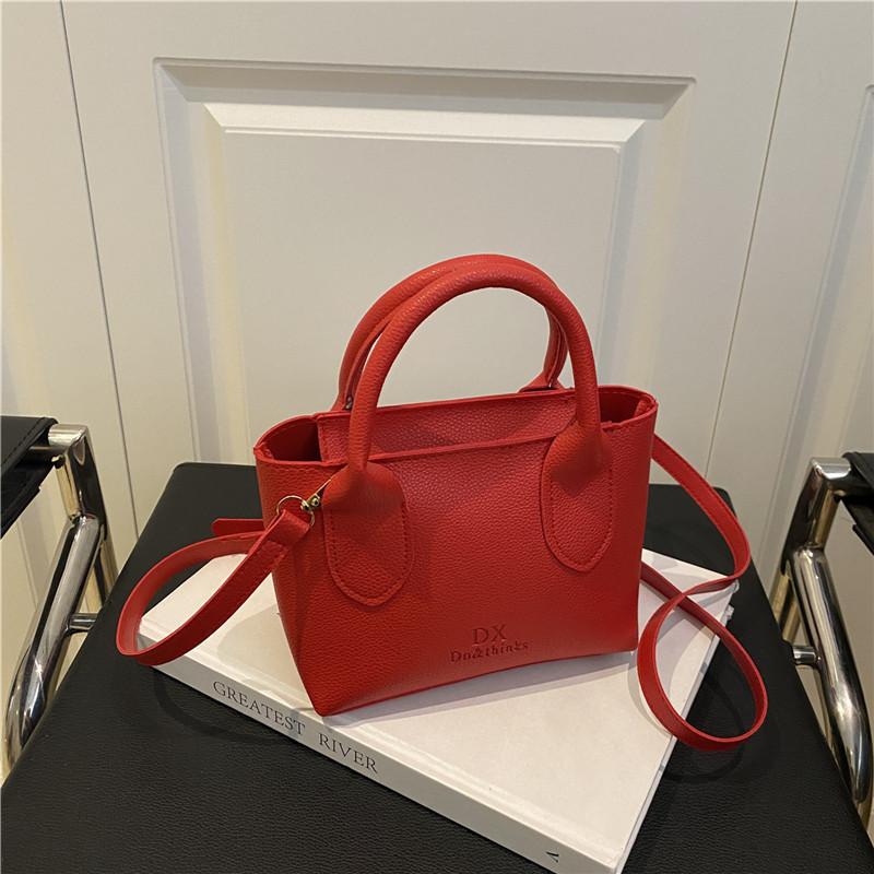 Sommer neue Mode einfach einfarbig atmosphärisch tragbare Bucket Bag Damen Pendler Schulter Messenger Bag