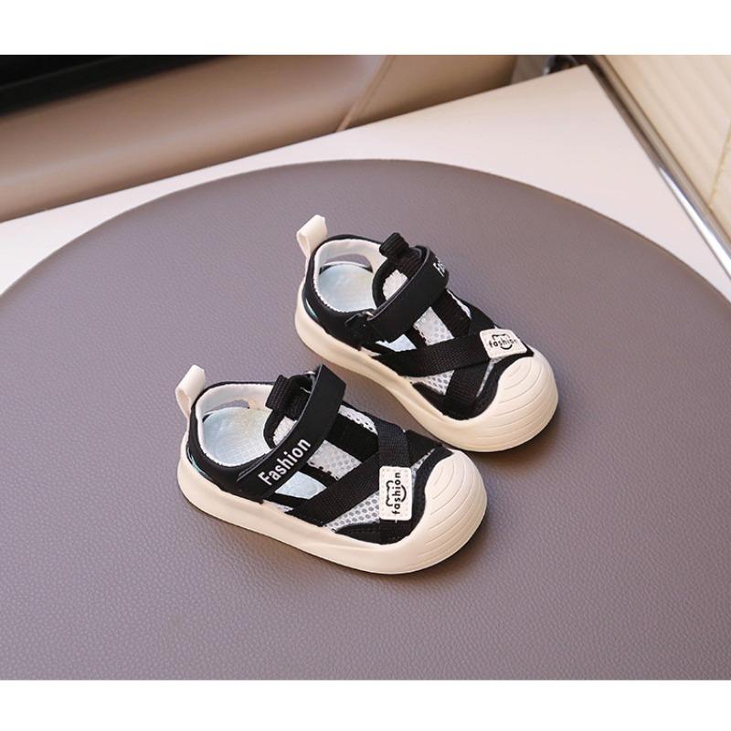 Sandalias para niños nuevo verano niños baotou casual hueco zapatos de playa niños medianos deportivos zapatos de bebé moda