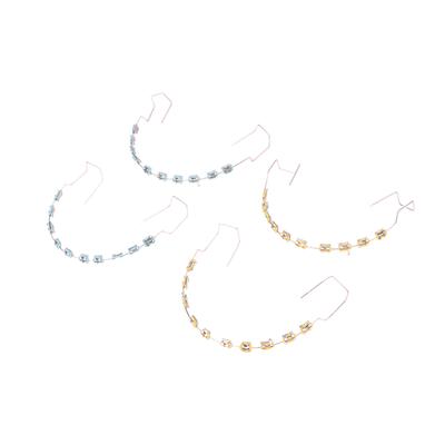 1 pár dočasných zubních dekorací s kovovými dráty, vícebarevný kovový držák, ortodontické ligatury, materiál pro zubaře