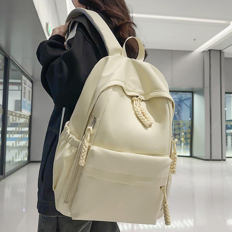 School bag children, elementary school students, girls, junior high school students, high school simple solid color college students, backpack,