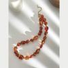 Stylish Red Resin Irregular Bead Necklace With Adjustable Length For Personalized Fit And Artistic Design In Sturdy Alloy Construction.