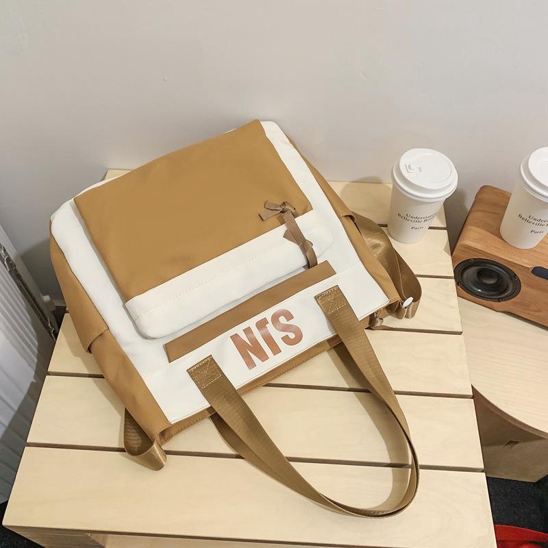 Schoolbag Japanese simple and fashionable backpack 1011 summer new middle school schoolbag college student college style alphabet backpack