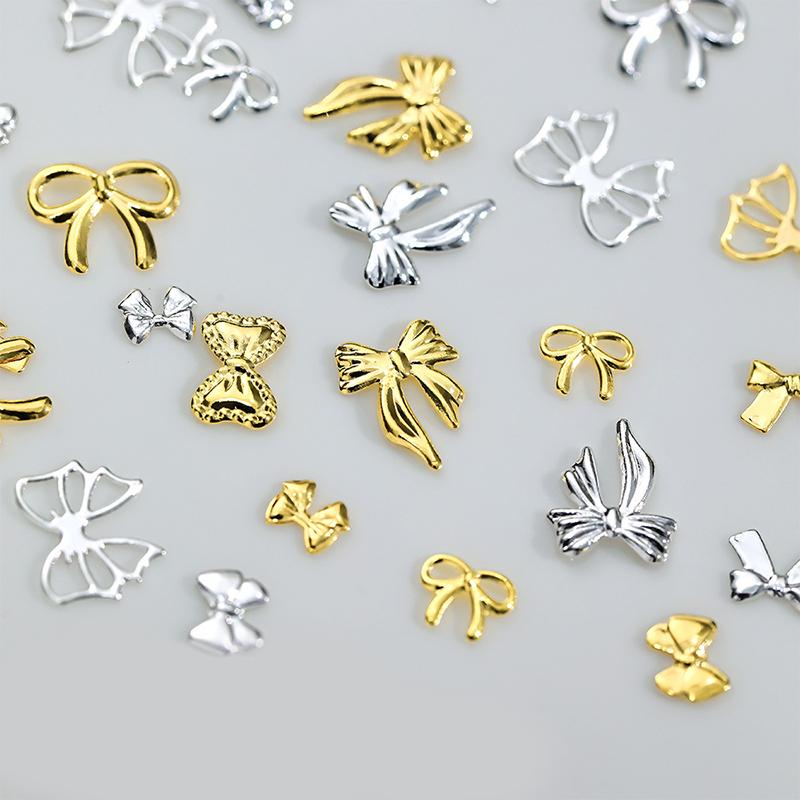 50 st Metalllegering Rosett Naglar Konst Dekoration Silver Guld Nagelberlocker DIY Manikyr Design Smyckestillbehör Verktyg
