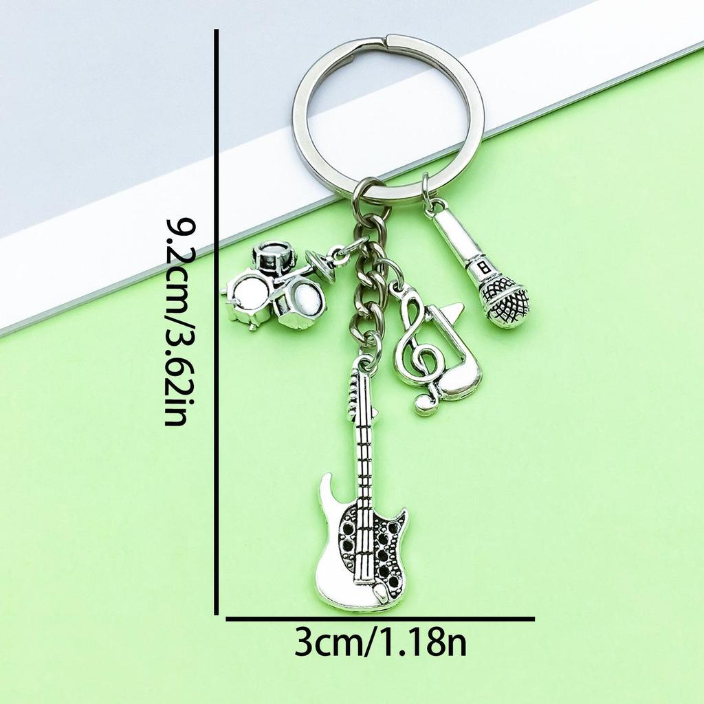 Antique Silver Music Cassette & Saxophone Keychain with Creative Design