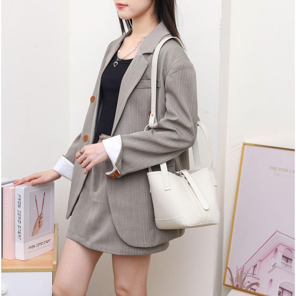 Damenhandtasche aus Rindsleder, Nischen-Crossbody-Mommy-Bag, Modischer und schlichter Gemüsekorb, Muschel-Tasche.