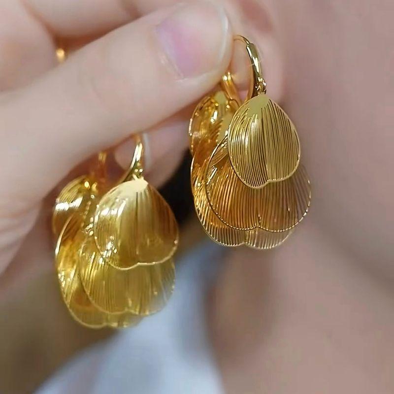 

European and American Style Light Luxury Metal Hollow Petal Tassel Ear Cuffs Earrings with Unique Design and Cool Style Gold Earrings