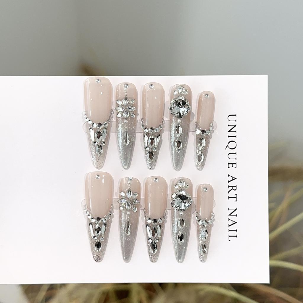 1PC Long, pointed silver cat-eye press-on nails; fully handmade; ultra-sparkly, fully rhinestone-encrusted false nail tips.
