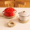 Stylish straw pot mat, heat-resistant with hook, perfect for iron kettles, pots, earthenware pots, and other ironware. A simple, decorative accessory