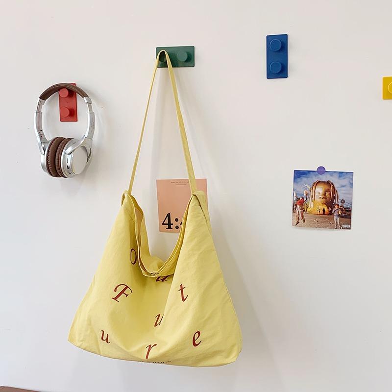 

Nylon bag women s large-capacity tote bag new casual fashion messenger college student versatile shoulder bag жёлтый