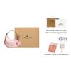 Coach Borsa a tracolla Carmen 20 Cinturino regolabile Stampa Moda Nuova Luna Borsa Ciondolo a fiore Borsa a spalla Piccola borsa a tracolla da donna Rosa CDW86-IMPO