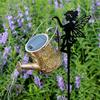 Solar-Powered Iron Art Flower Fairy Lawn Lamp Outdoor Waterproof Garden Kettle Hollow Rojection Light for Decorative Outdoor Use