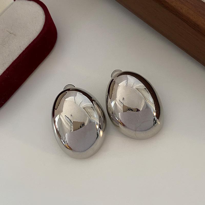 

Золотая заклепка Высокого класса Большая гальваническая трехмерная яйцевидная трехмерная простая атмосфера преувеличенная серебряный