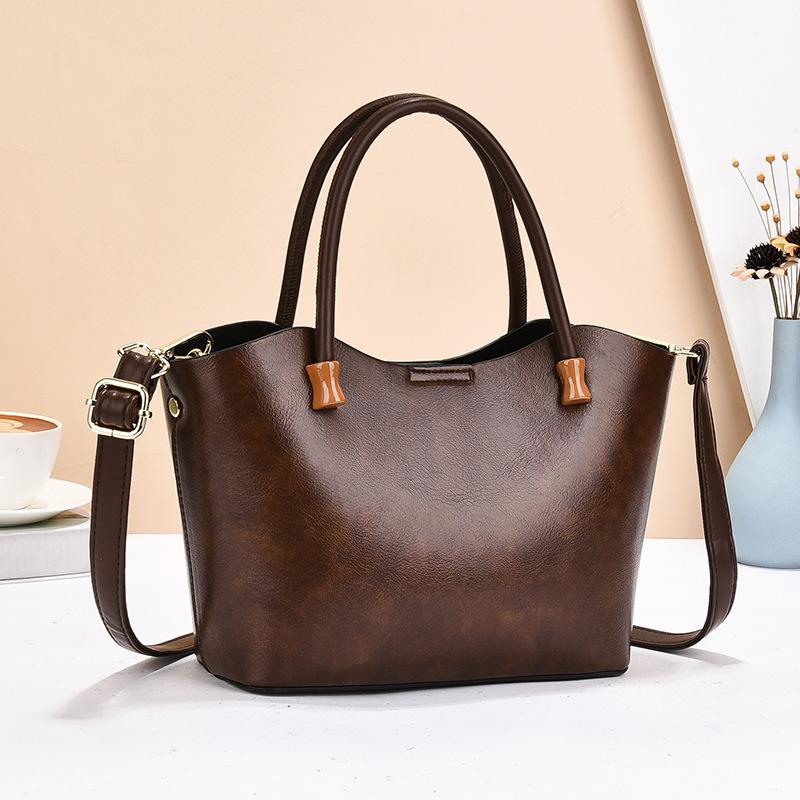 

Handbag bag large capacity shoulder bag messenger bag texture versatile 22*9*18 кавовий