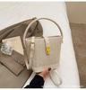 2005 New Large-capacity Straw Bag Niche Woven Portable Shoulder Bag Vacation Style Vacation Bucket Bag Lock Bag