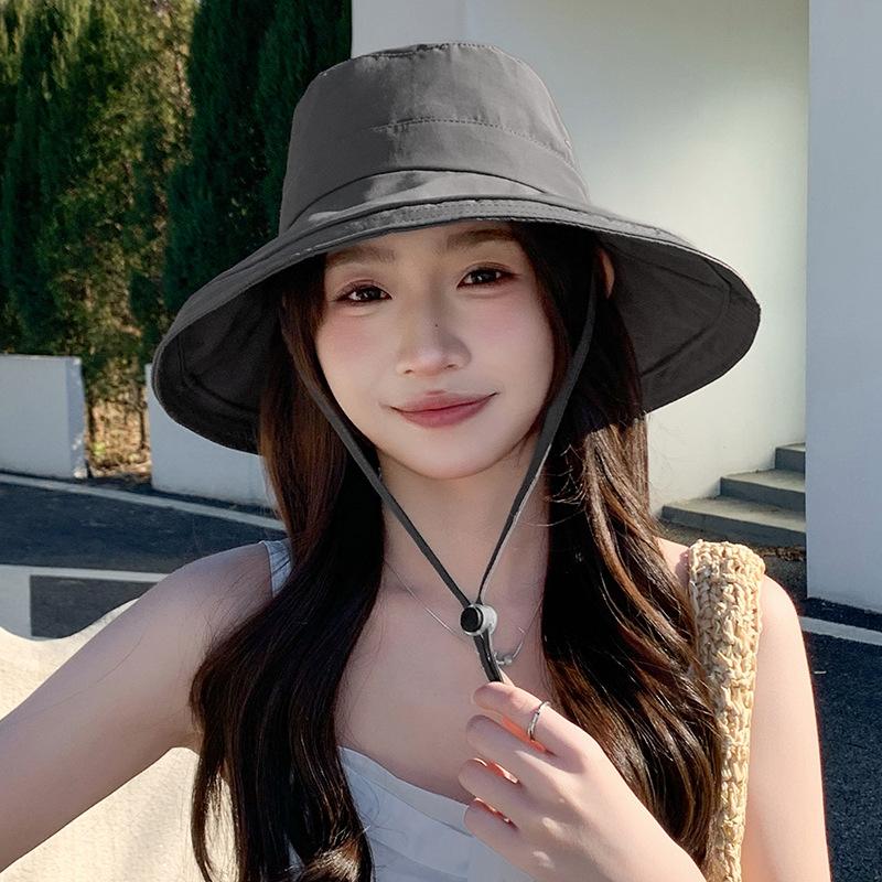 Chapeau d'été pliable pour femmes protection UV chapeau de soleil à large bord chapeau seau version coréenne séchage rapide imperméable chapeau de protection solaire