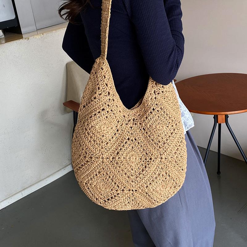 Hollow ins vacation shoulder bag retro straw bag women's 2025 summer new Mori braided shoulder tote bag