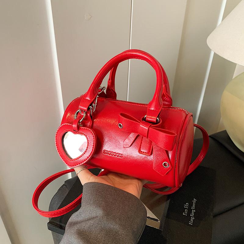 Roztomilá válcová taška dámská 2025 nová móda přenosná růžová taška polštář jednoduchá přes rameno messenger dámská taška