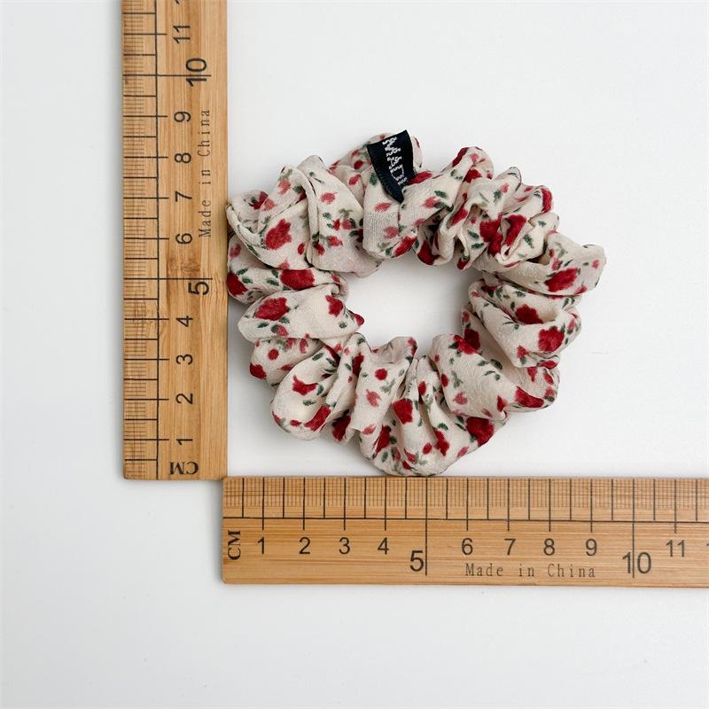 Fresh and Light Floral Fabric Hair Band for Loose Braided Hairstyle in Summer - A Stylish Ponytail Hair Accessory Made of Elastic Band.