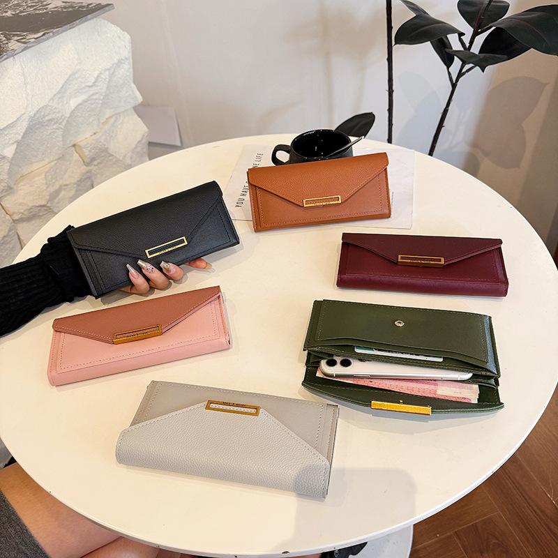 Wallet female long model new Korean version simple thin large capacity multi-card position folding card bag wallet clutch bag