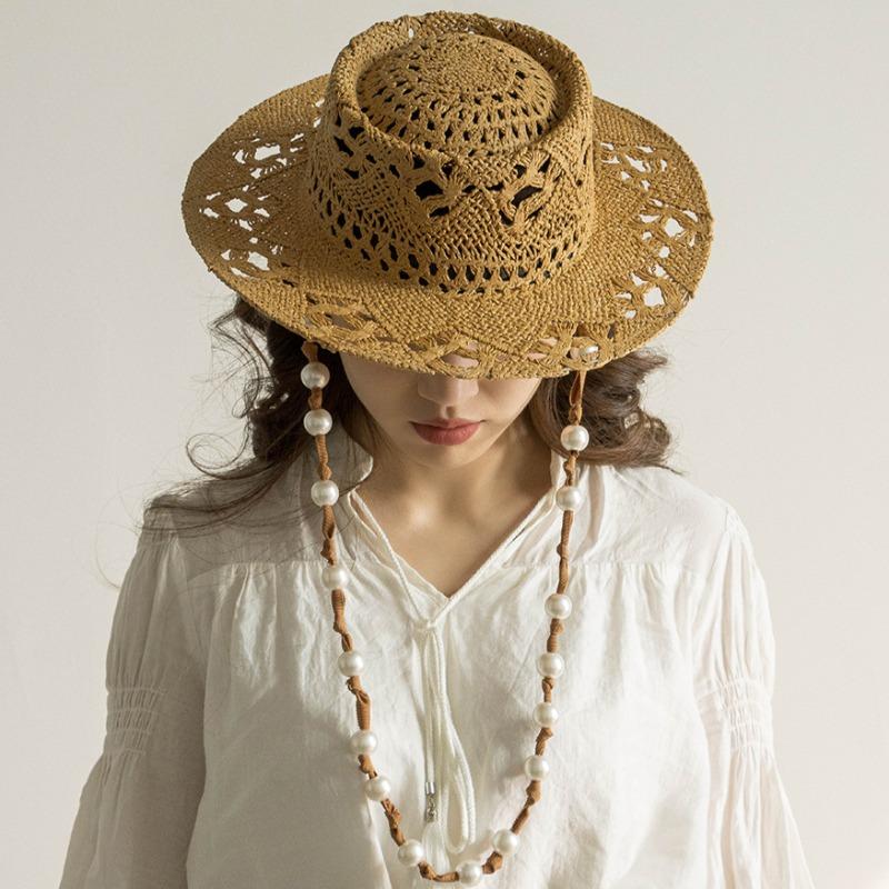 Designer Elegant Light Luxury Straw Hat Women Knitted Hanging Chain Pearl Hand Woven Hollow Beach Hat Fashion Wide Brim Sun Hats