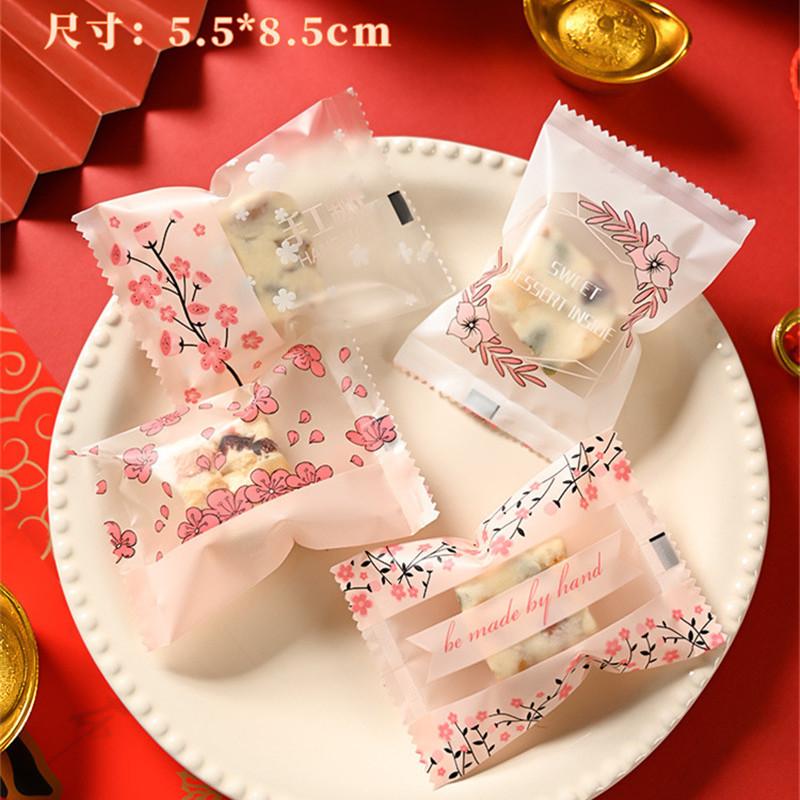 100Pcs 5.5x8.5cm Small Nougat Candy Chinese New Year Snowflake Crispy Packaging Machine Sealing Bags