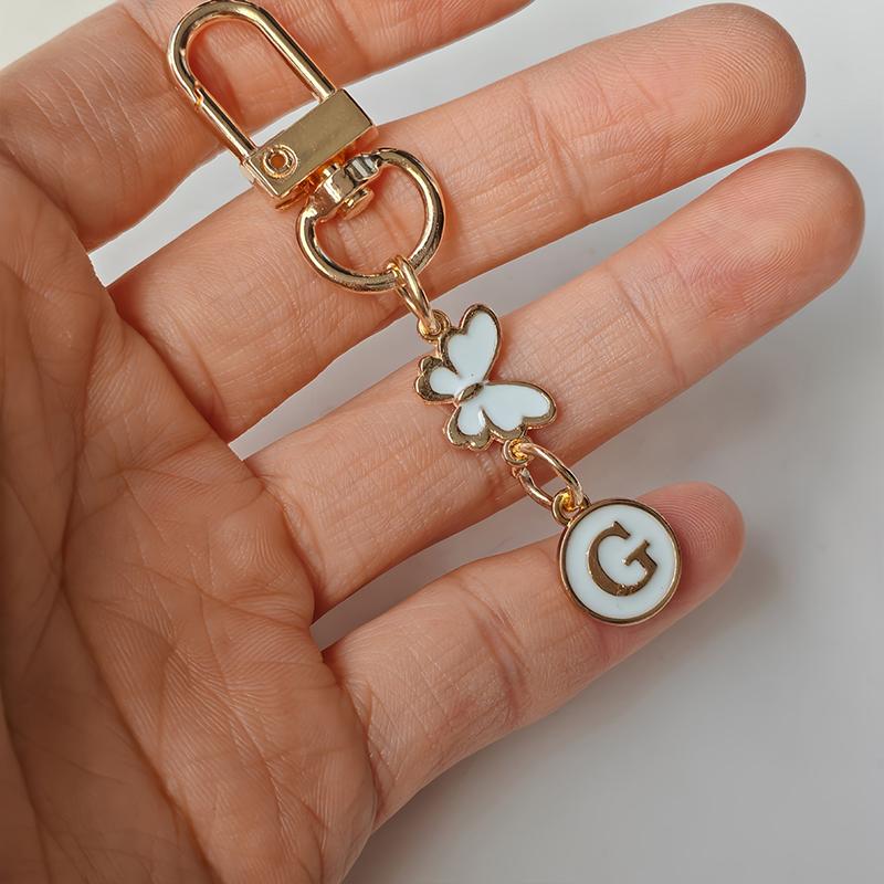 

1 шт. Металлический брелок для ключей, Спутник для ключей от машины, Логотип ключа, Легкий брелок с монограммой в виде бабочки, Шарм с монограммой, Шарм для сумки, Долговечность, Брелок