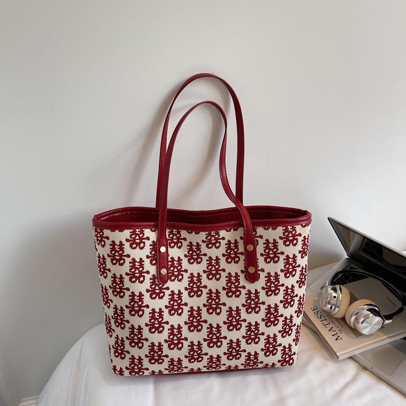 

Red high-value fashion festive tote bag women s 2025 autumn new niche festive simple shoulder bag women