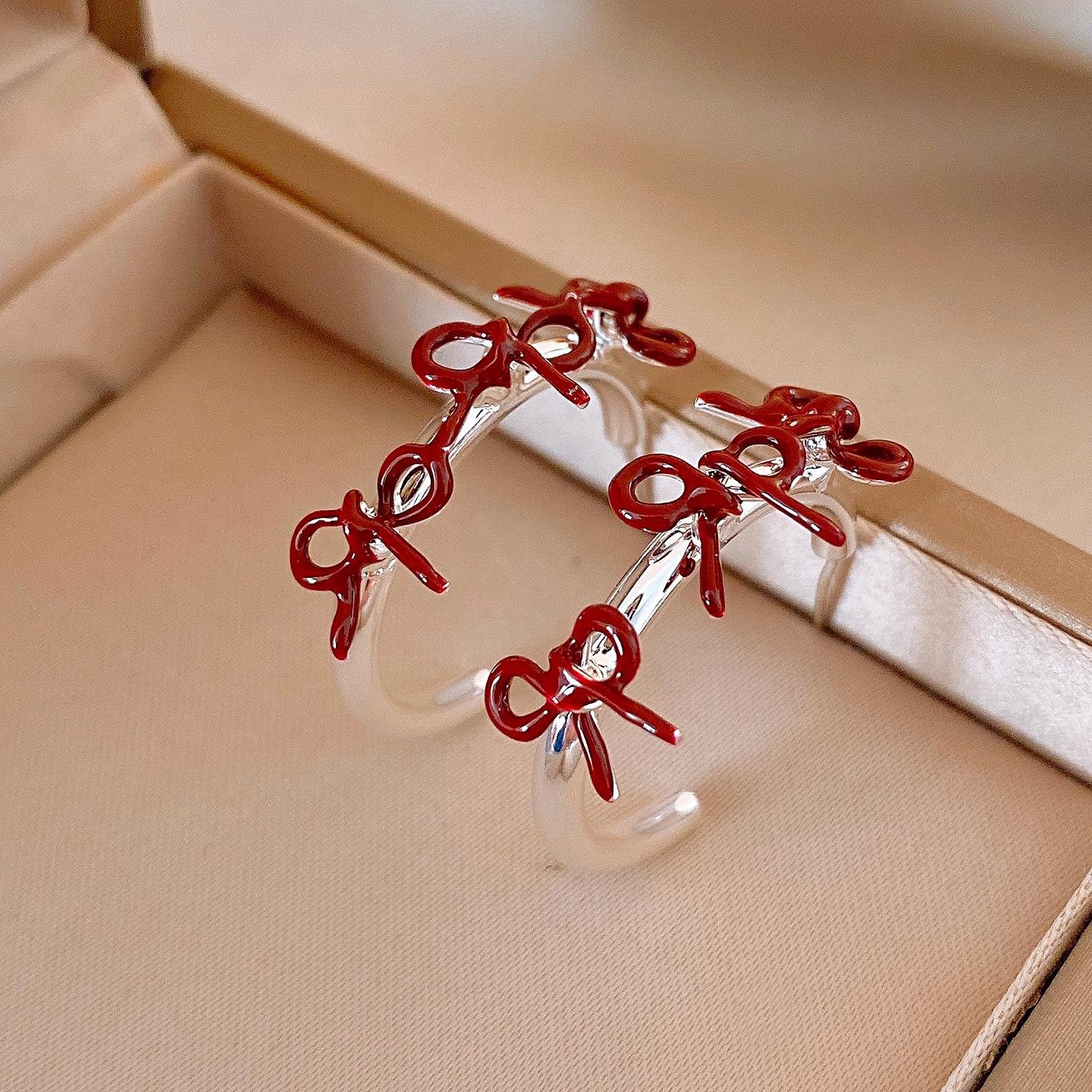 Korean sweet C-shaped oil drop bow earrings, studs, exquisite temperament earrings.