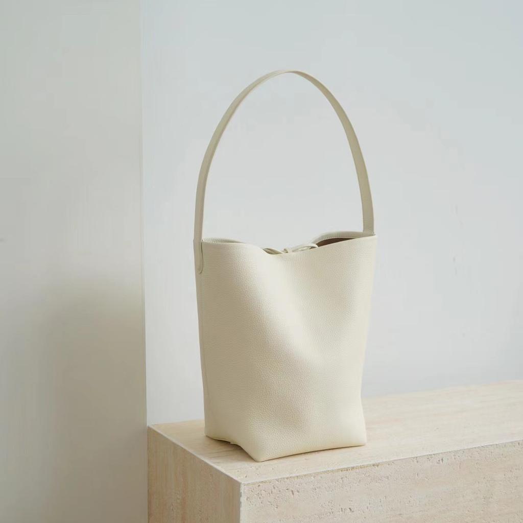 Haute couture niche TR bucket bag women's first layer cowhide minimalist high sense portable large capacity commuting shoulder tote bag