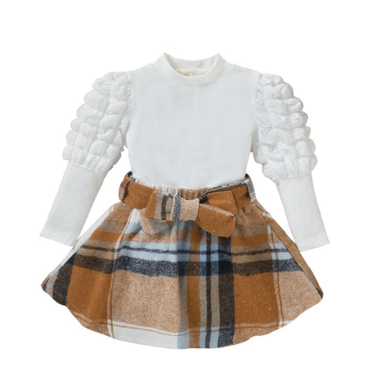 

Комплект из двух предметов для девочек до 4 лет: однотонные топы и клетчатая юбка с бантом 120